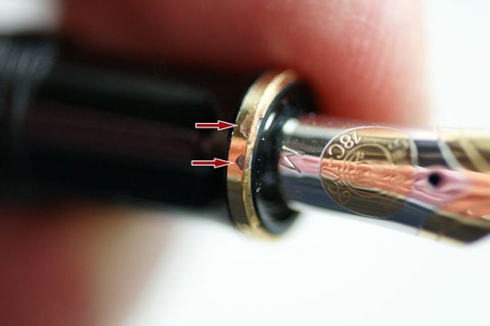 Corrosion of a gold plated section trim ring (Pelikan black M600, pre-'97)