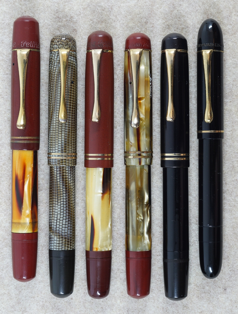 Pelikan 100N and 101N models along with an IBIS 130 demonstrating different clip lengths